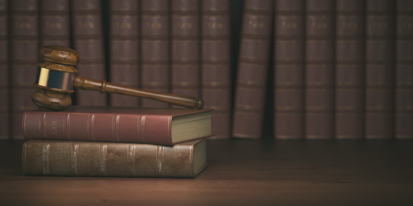 Gavel on vintage law books